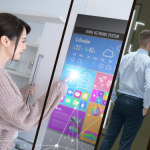 Urban commuters interacting with multiple digital screens